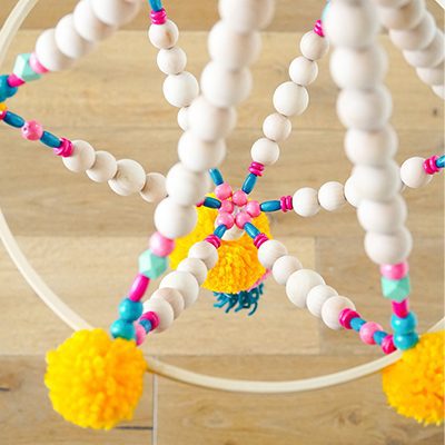 DIY Wood Bead Pom Pom Chandelier